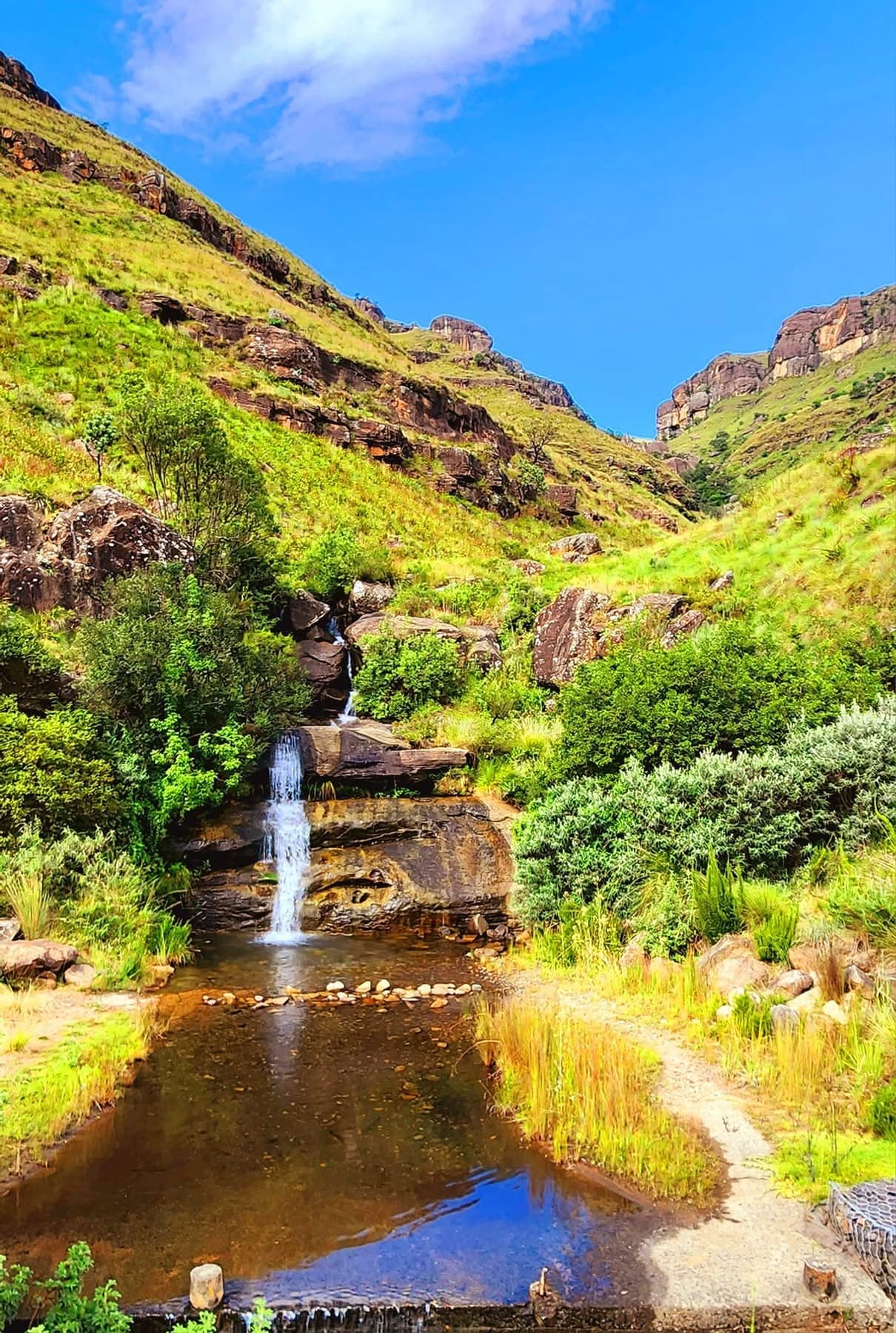 The switchback road climbing Sani Pass through the Drakensberg